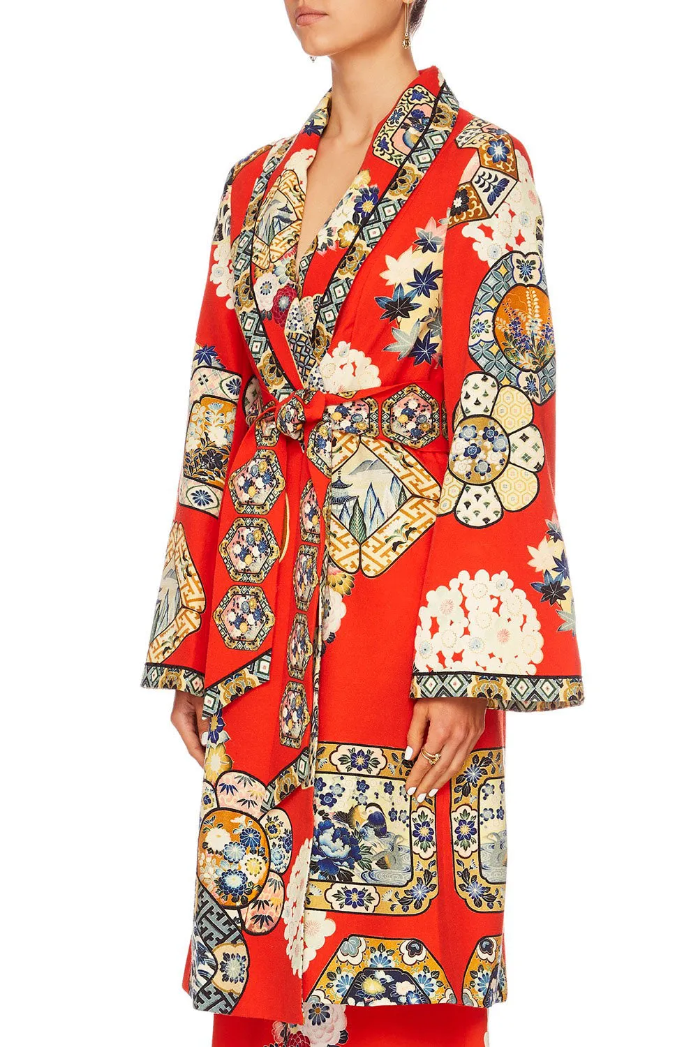 FLARED SLEEVE TRENCH FOUND IN TRANSLATION
